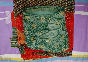 Elegant Orange Printed Saree with Floral and Geome
