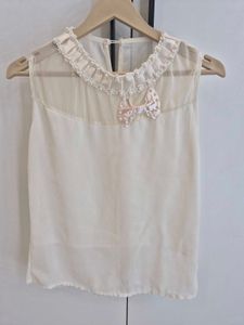 Sleeveless Cream Top