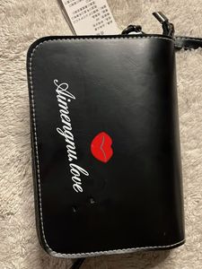 Black Kiss Sling Bag