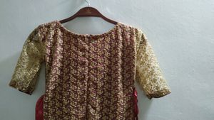 Maroon Satine Long Gown With Golden Net.