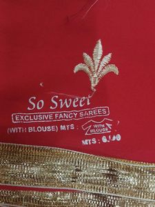 Elegant dark orange Embroidered Saree