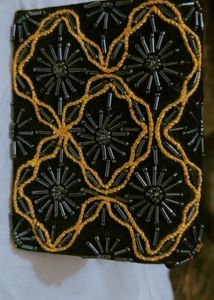 black and golden clutch