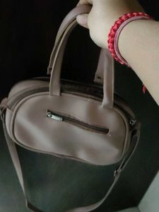 Dera Handbag with Floral Accent