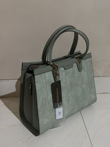 Light Pista Green Color Handbag 👜
