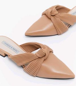 Charles & Keith nude knotted Mules