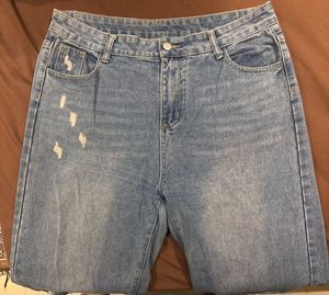 Ripped Knee Denim Jeans