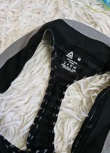 Reebok Thong - Size Small