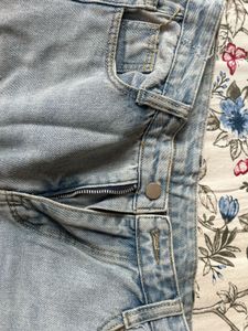 Ripped Light Wash Wide Leg Jeans