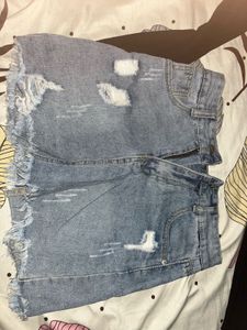 Ripped Light Washed Denim Skirt