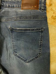 Distressed Denim Jeans