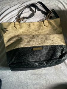 Vintage designer Christian Siriano handbag