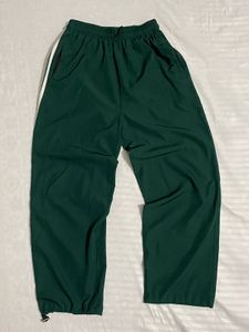 Green Track Pants with White Stripe