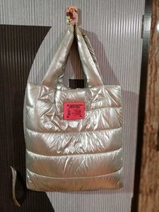 Justice Silver Puffer Tote Bag