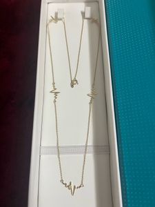 Authentic 18 CRT Gold Heartbeat Necklace