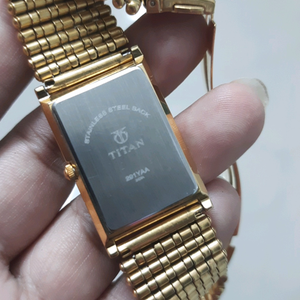 titan golden watch