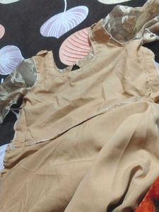 It&#39;s Beige color Gown.  I