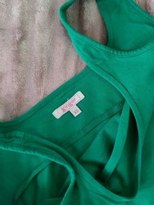 GREEN CROP TOP WITH SIDE STRINGS