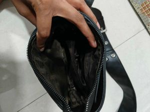 A Cute black Grungy Sling Bag