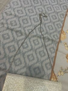 Silver Shinning Clutch