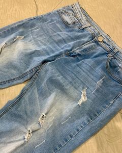 Light Blue Distressed Denim Jeans