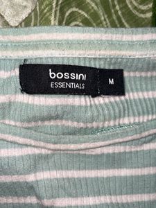 green and white striped top