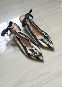 Striped  sling back ribbon heel.