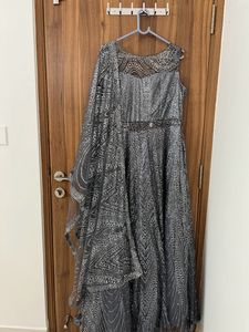 Grey Glitter Ethnic Gown With Transparent Neck