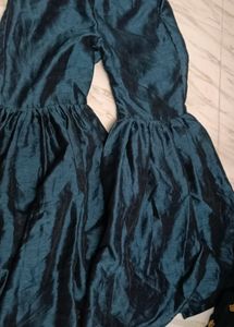 Its a Blue Dress.. With Beads Work On It.