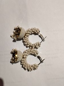 A Plastic Work Jhumka With Whitish Colour
