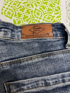 Distressed Denim Shorts