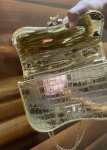 golden hand bag ( ceiling ba