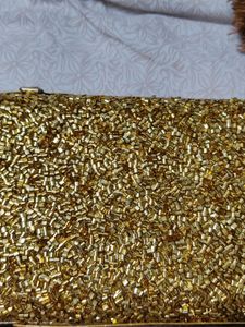 Price Dropped Golden Clutch Without Chain .