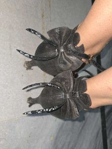 fancy used black high heels with bow