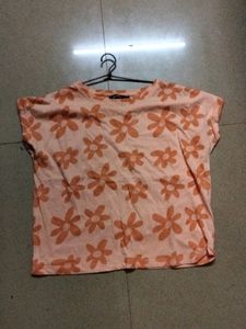 bust size 30 ... orange colour... floral flower print....