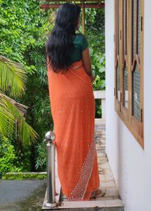Orange Saree With White Stone Work