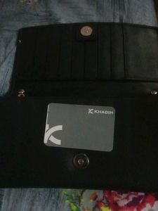 Khadims Clutch