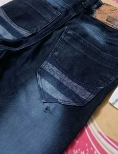 Stylish Jeans with Red Stripe