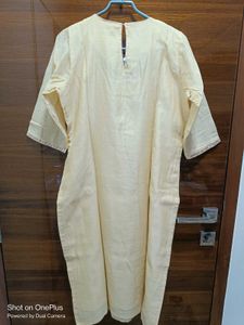 Beautiull cream kurti with neck work