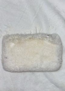 Fluffy White Pouch