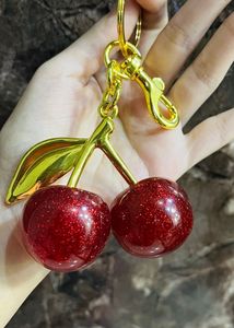 COACH DUPE RED CHERRY CHARM KEYCHAIN