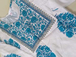New White Colour Kurti With Heavy Neck Design