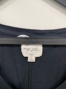 Own Your "Midnight Essential" V-Neck! 🖤✨🏙️