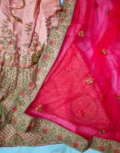 Peach and pink Embroidered bridal Lehenga Choli