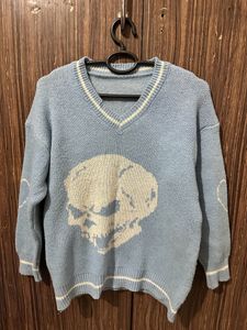 A Blue Skull Sweater.
