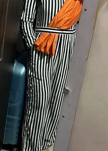 Bold Striped Jumpsuit with Statement Orange Detail