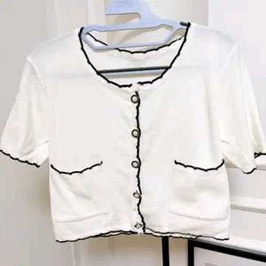 Chic White Cardigan with Black Trim