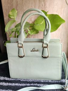 Handbag With Additional Sling Strap