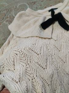 Elegant Knit Sweater with Bow Detail