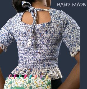 Floral Smocked Peplum Top