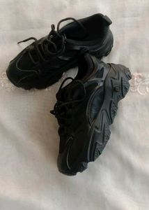 black chunky sole shoe